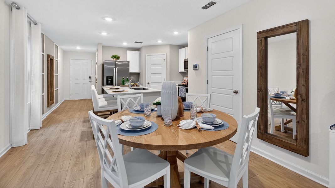 Representative furnished interior of a home built from the Greyson II by D.R. Horton in Irongate Villas, Jacksonville (Image 11).