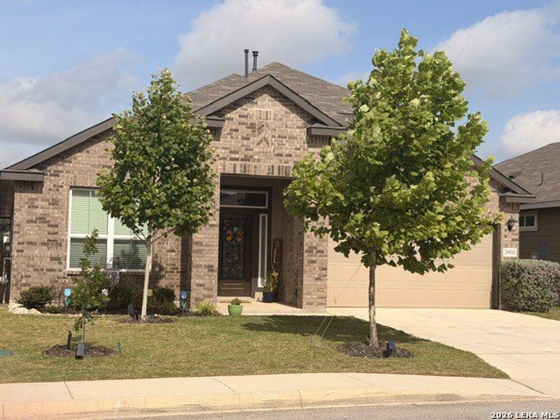 Front exterior of a new home in Copper Canyon, Bulverde, TX, highlighting curb appeal (Image 2). Front exterior of a new home in Copper Canyon, Bulverde, TX, highlighting curb appeal (Image 2).