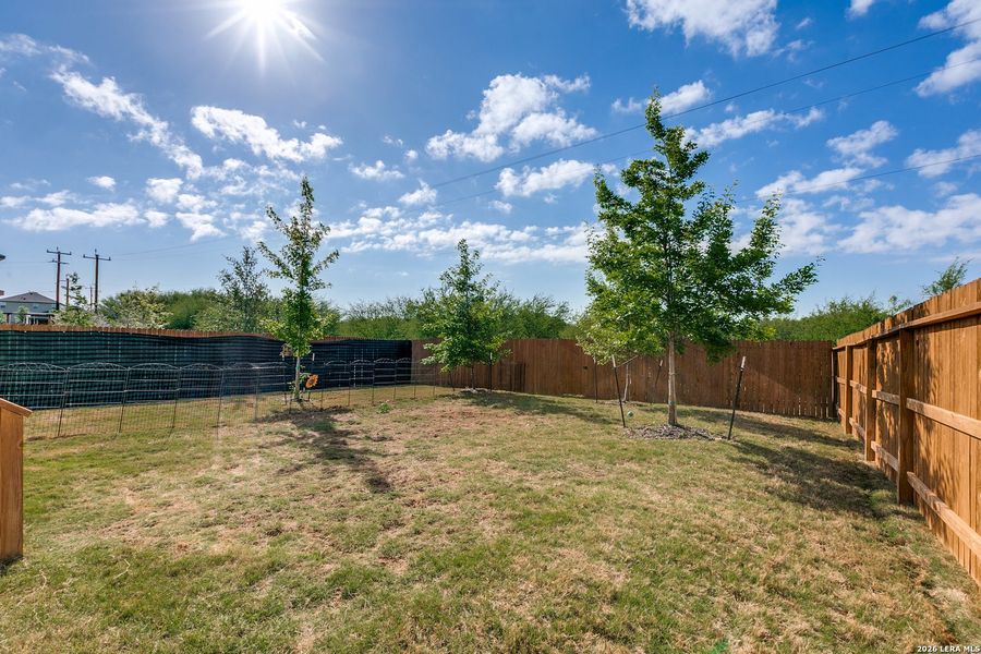 Exterior details and patio area of a home in Redbird Ranch, San Antonio (Image 22).