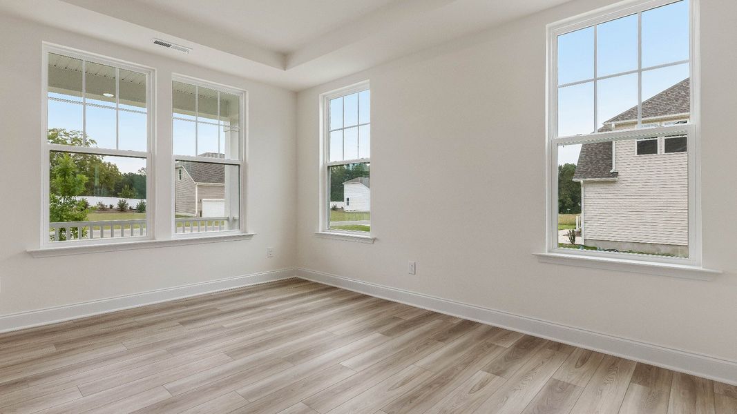 Stonehaven home plan formal dining room with tray ceiling Stonehaven home plan formal dining room with tray ceiling