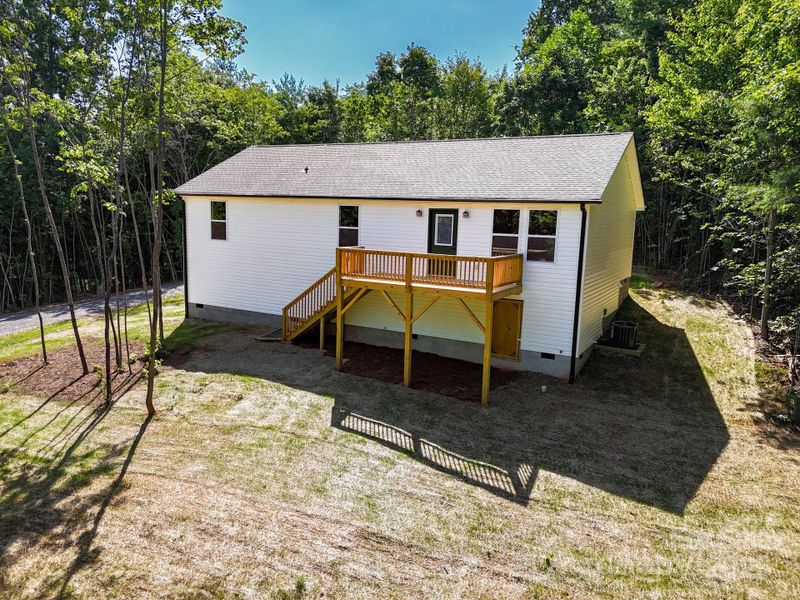 Front exterior of a new home in , Candler, NC, highlighting curb appeal (Image 19).