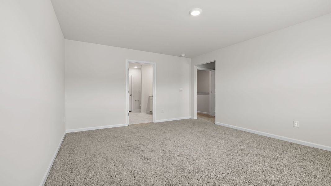 Spacious, unfurnished interior of a new home in Tanglewood Townes, Greenville (Image 28).