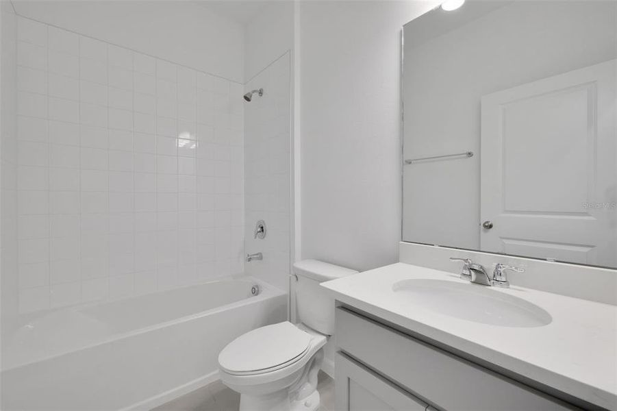 Furnished interior view inside a new home in Seaport Village, Tavares (Image 14).