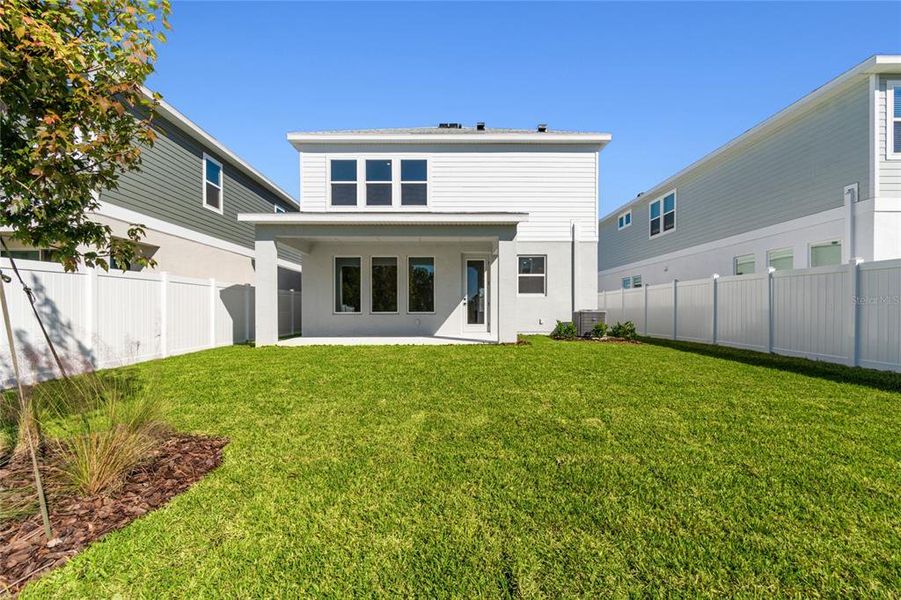 Exterior details and patio area of a home in Persimmon Park - Garden Series, Wesley Chapel (Image 3).