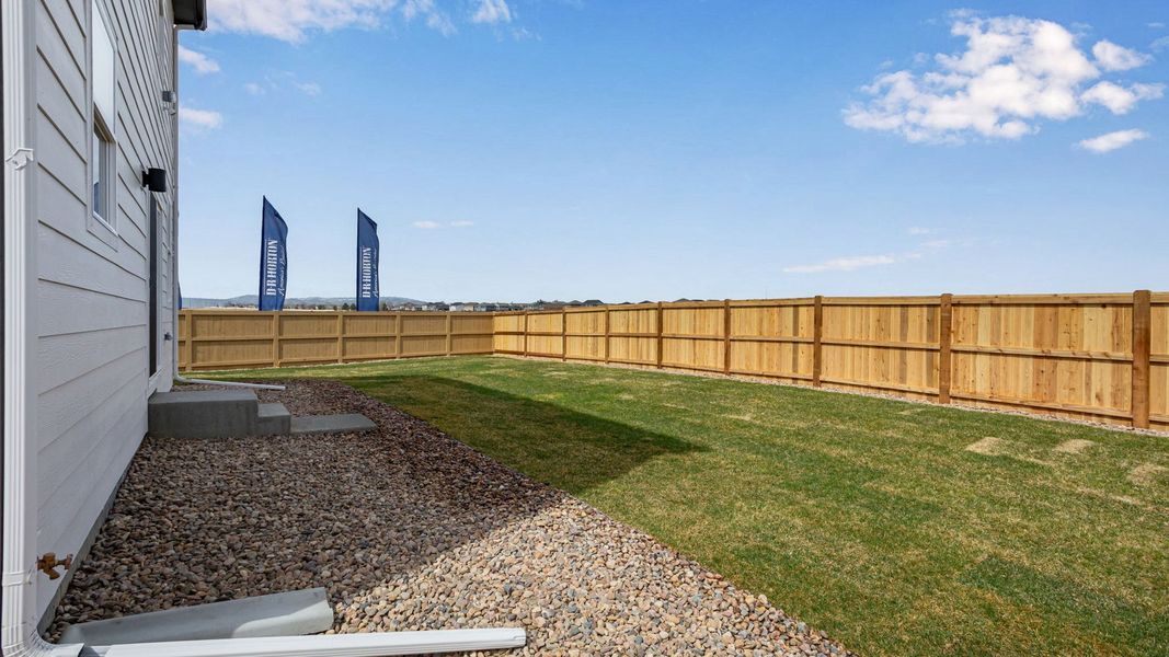 Exterior details and patio area of a home in Granary, Johnstown (Image 24).
