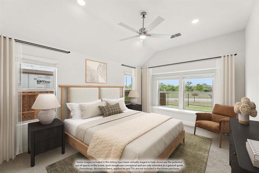Bedroom with vaulted ceiling, ceiling fan, wood-frame bed, and large windows with outdoor views Bedroom with vaulted ceiling, ceiling fan, wood-frame bed, and large windows with outdoor views