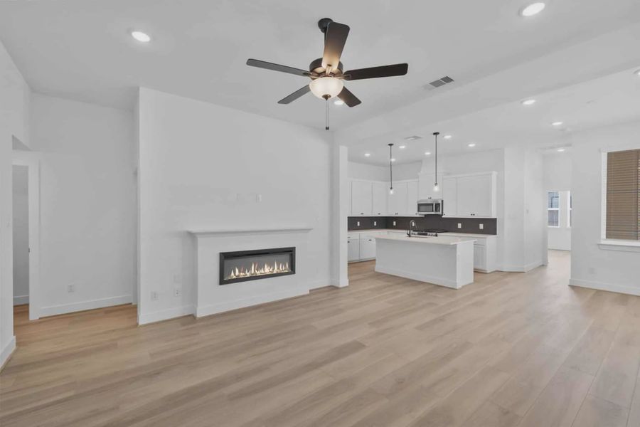 Representative unfurnished interior of a home built from the Versailles by Chesmar Homes in Meridiana Chateau, Manvel (Image 21).