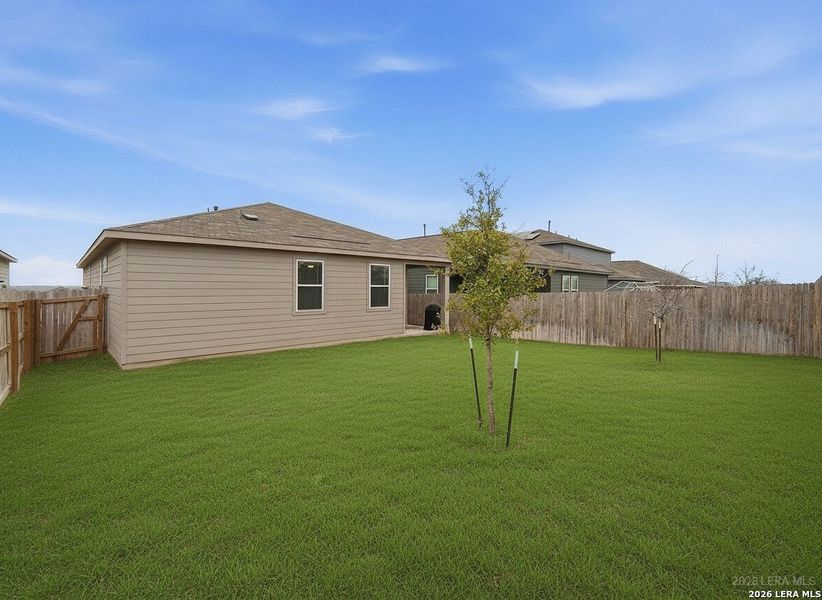 Exterior details and patio area of a home in Hunter's Ranch, San Antonio (Image 23).