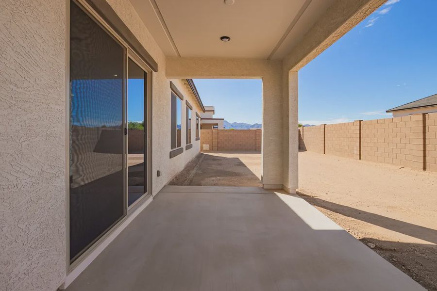 Exterior details and patio area of a home in Valencia at Granite Vista, Waddell (Image 4).