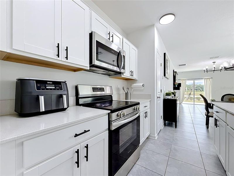 Furnished interior view inside a new home in Peace Creek Reserve, Winter Haven (Image 8). Furnished interior view inside a new home in Peace Creek Reserve, Winter Haven (Image 8).