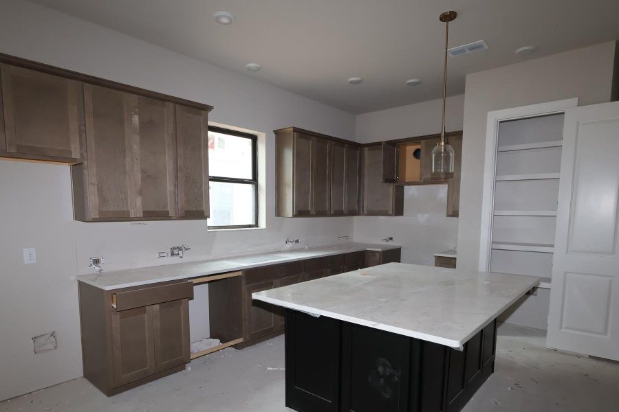 Furnished interior view inside a new home in Sienna - Landmark Row Collection, Missouri City (Image 3).