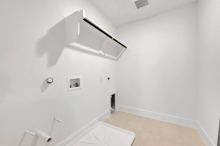 Spacious, unfurnished interior of a new home in Union Park, Little Elm (Image 25). Spacious, unfurnished interior of a new home in Union Park, Little Elm (Image 25).