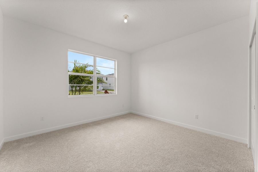 Spacious, unfurnished interior of a new home in Tradition - Cadence, Port St. Lucie (Image 12).