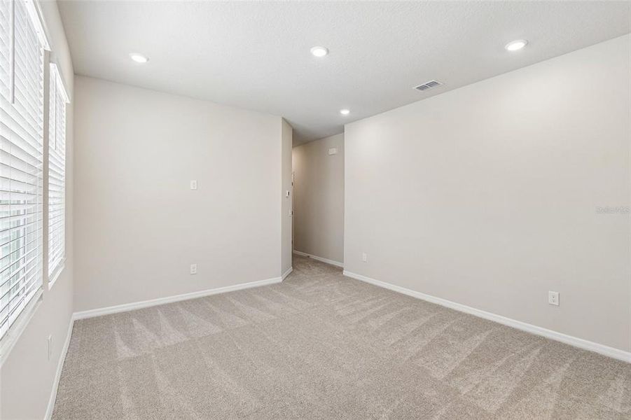 Spacious, unfurnished interior of a new home in Palmeras at Crossprairie – The Magnolia Collection, St. Cloud (Image 13).