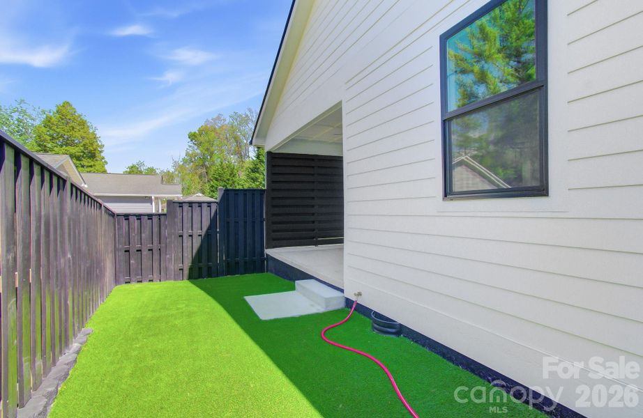 Exterior details and patio area of a home in , Hendersonville (Image 26).