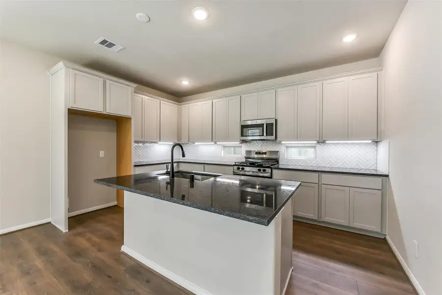 Furnished interior view inside a new home in Colony at Pinehurst, Pinehurst (Image 7). Furnished interior view inside a new home in Colony at Pinehurst, Pinehurst (Image 7).