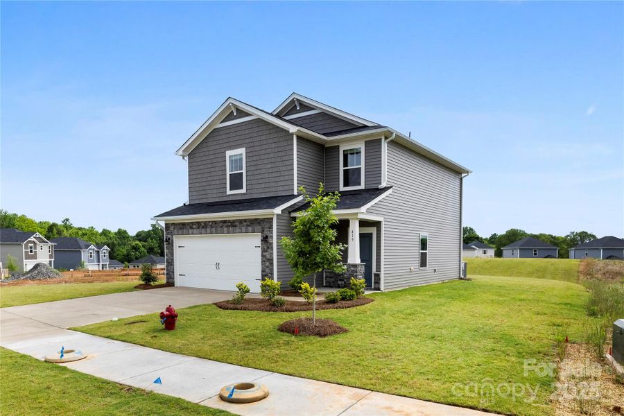 Front exterior of a new home in Seattle Crossing, Shelby, NC, highlighting curb appeal (Image 15).