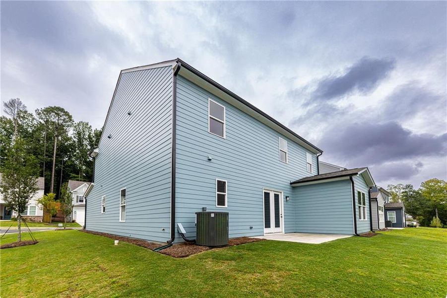 Exterior details and patio area of a home in Enclave at Edgewater, Canton (Image 4).