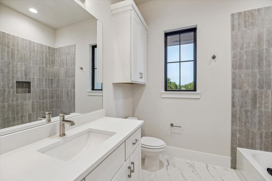 1 of 4 Secondary Baths. 1 of 4 Secondary Baths.