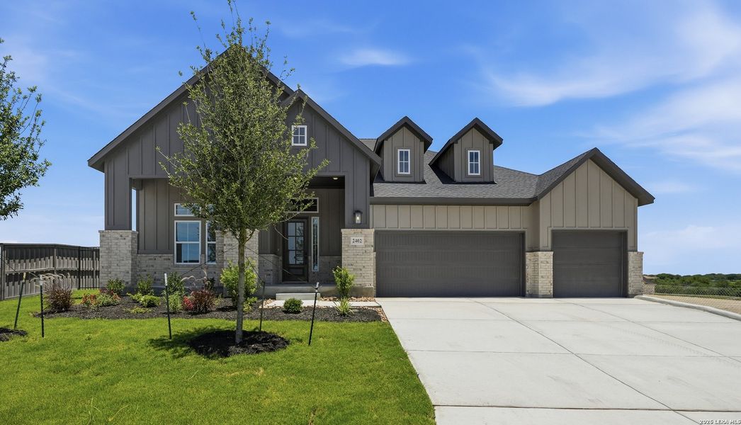 Front exterior of a new home in Prominence Urban, San Antonio, TX, highlighting curb appeal (Image 2). Front exterior of a new home in Prominence Urban, San Antonio, TX, highlighting curb appeal (Image 2).