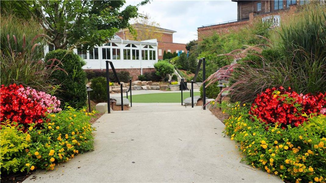 Front exterior of a new home in Byers Park, Alpharetta, GA, highlighting curb appeal (Image 1).