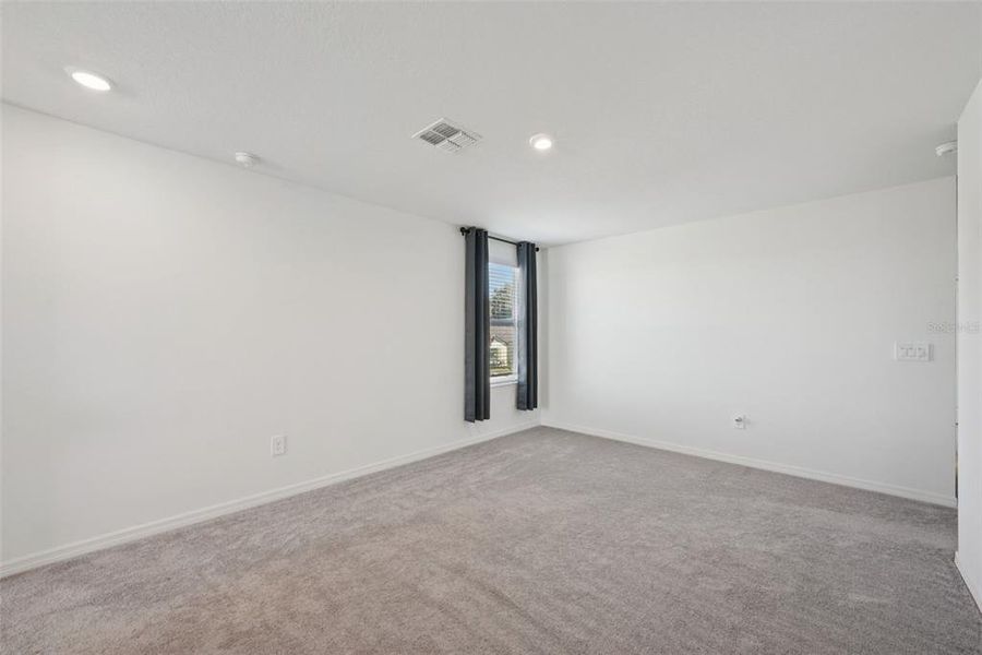 Spacious, unfurnished interior of a new home in Park East: The Manors, Plant City (Image 28). Spacious, unfurnished interior of a new home in Park East: The Manors, Plant City (Image 28).