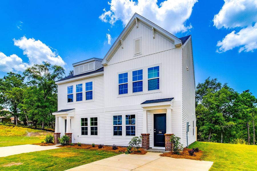 Front exterior of a new home in Padgett Commons, Hopkins, SC, highlighting curb appeal (Image 2). Front exterior of a new home in Padgett Commons, Hopkins, SC, highlighting curb appeal (Image 2).
