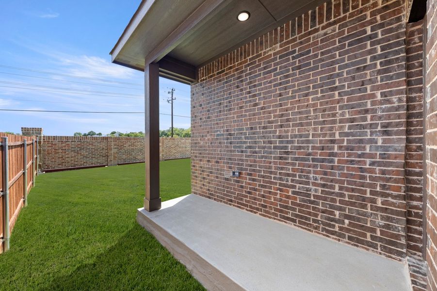 Front exterior of a new home in Churchill, Anna, TX, highlighting curb appeal (Image 28). Front exterior of a new home in Churchill, Anna, TX, highlighting curb appeal (Image 28).