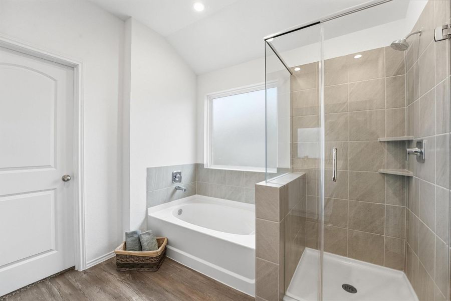 Primary ensuite with soaking tub and seperate walk-in shower Primary ensuite with soaking tub and seperate walk-in shower