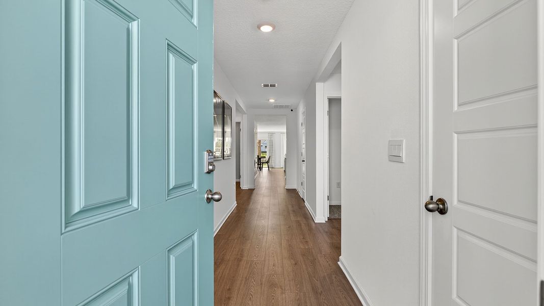 Representative unfurnished interior of a home built from the CALI by D.R. Horton in Sawmill Branch Express, Palm Coast (Image 20).
