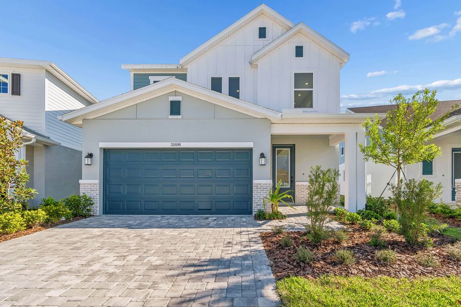 Representative exterior photo of a completed home built from the The Pickett by David Weekley Homes in Chapel Crossings - Garden Series, Wesley Chapel, FL (Image 3).