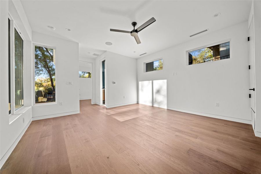Lower level living room, bedroom 5 and full bath with direct access to the pool.