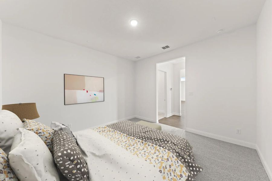 The Brenner A Primary Suite Bedroom
