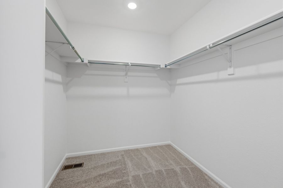 Spacious, unfurnished interior of a new home in Woodrose at Painted Prairie, Aurora (Image 16).