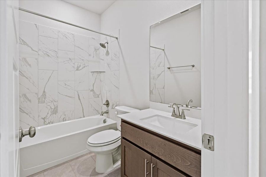 Furnished interior view inside a new home in Trace, San Marcos (Image 14).