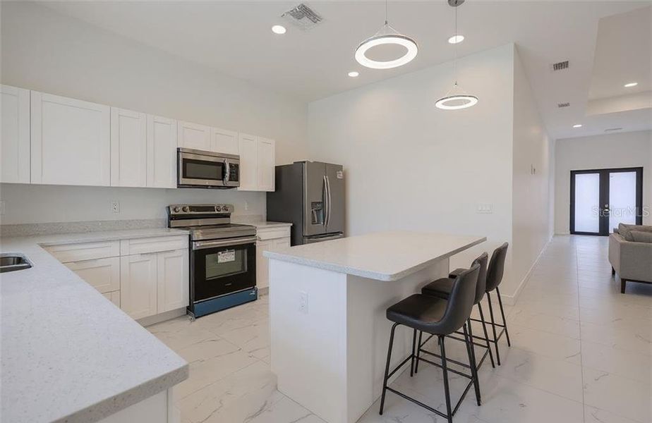 Furnished interior view inside a new home in , Cape Coral (Image 32).