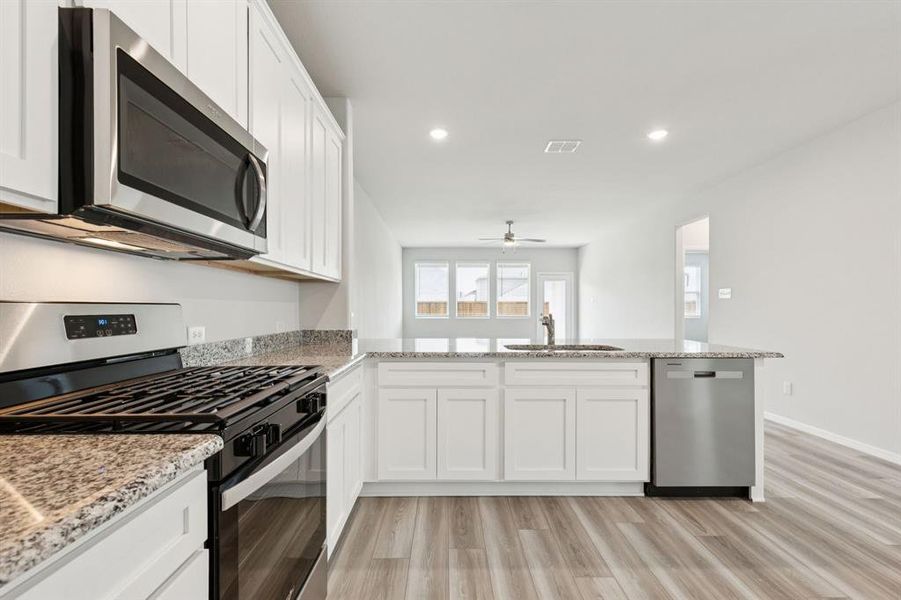Furnished interior view inside a new home in AnaCapri, Anna (Image 6).