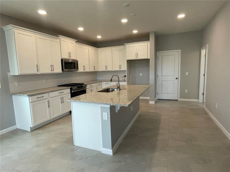 Furnished interior view inside a new home in Center Lake on the Park, St. Cloud (Image 33).