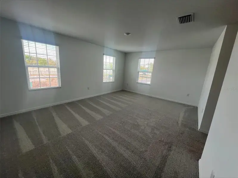 Spacious, unfurnished interior of a new home in Thompson Village Townhomes, Apopka (Image 7).