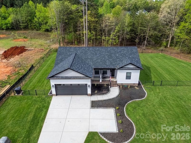 Front exterior of a new home in , Crouse, NC, highlighting curb appeal (Image 24).