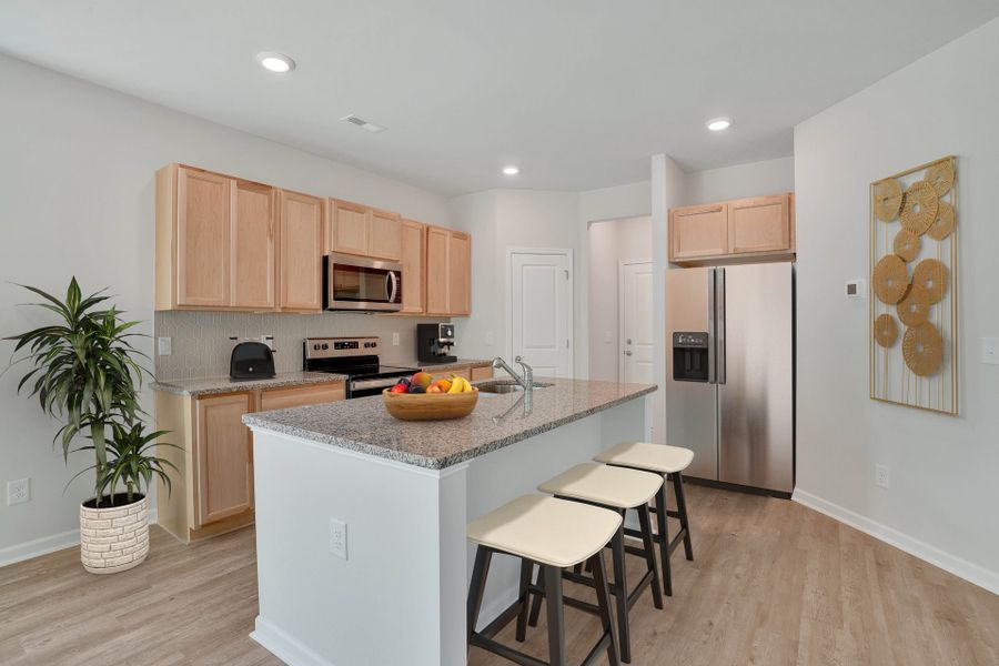 Representative furnished interior of a home built from the Alexander by McKee Homes in Bedford, Raeford (Image 7).