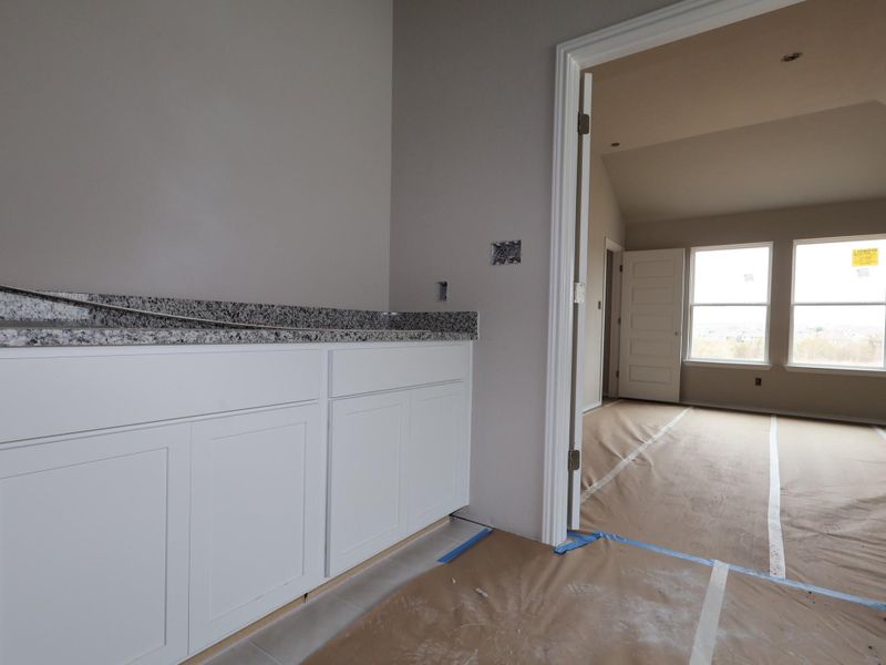 In-progress construction of a new home in Carillon, Manor, TX (Image 22).