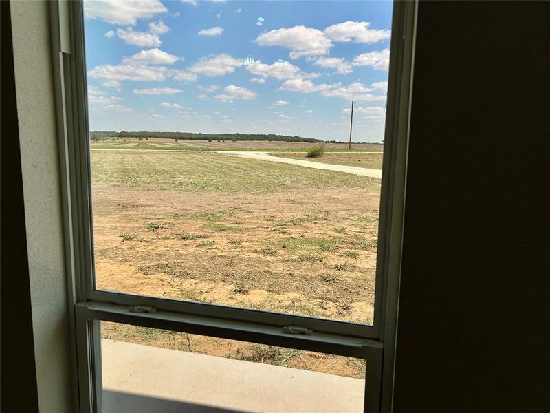 View of yard featuring a rural view and agricultural area