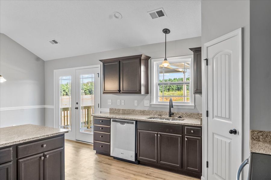 Representative furnished interior of a home built from the Whitney by Enchanted Homes in Lonesome Dove, San Antonio (Image 8).