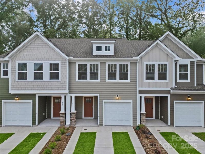 Front exterior of a new home in Clayton Crossing, Arden, NC, highlighting curb appeal (Image 1). Front exterior of a new home in Clayton Crossing, Arden, NC, highlighting curb appeal (Image 1).