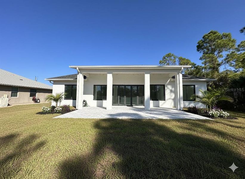 Exterior details and patio area of a home in , North Port (Image 2).