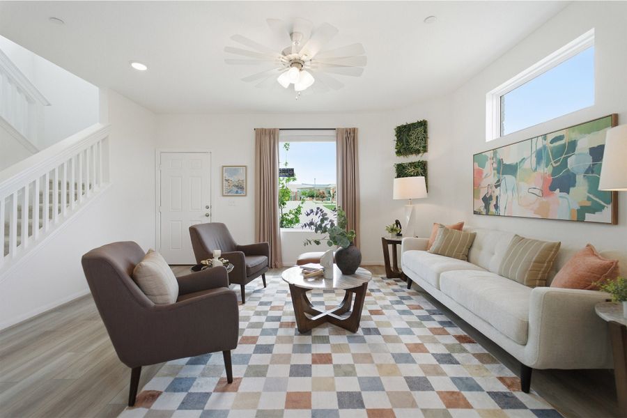 Representative furnished interior of a home built from the Kahn by CastleRock Communities in Municipal Drive Townhomes, Leander (Image 7).