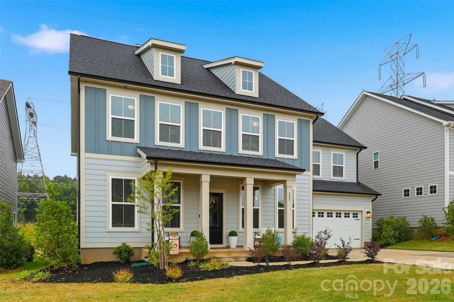 Front exterior of a new home in Lakeside Glen, York, SC, highlighting curb appeal (Image 1). Front exterior of a new home in Lakeside Glen, York, SC, highlighting curb appeal (Image 1).