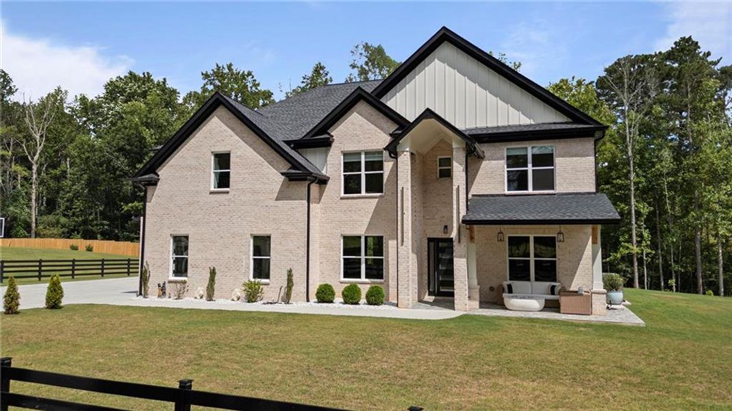 Front exterior of a new home in , Lawrenceville, GA, highlighting curb appeal (Image 24).
