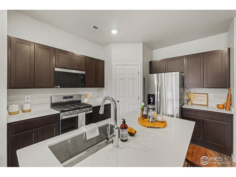 Furnished interior view inside a new home in Poudre Heights: The Meadow Collection, Windsor (Image 31).